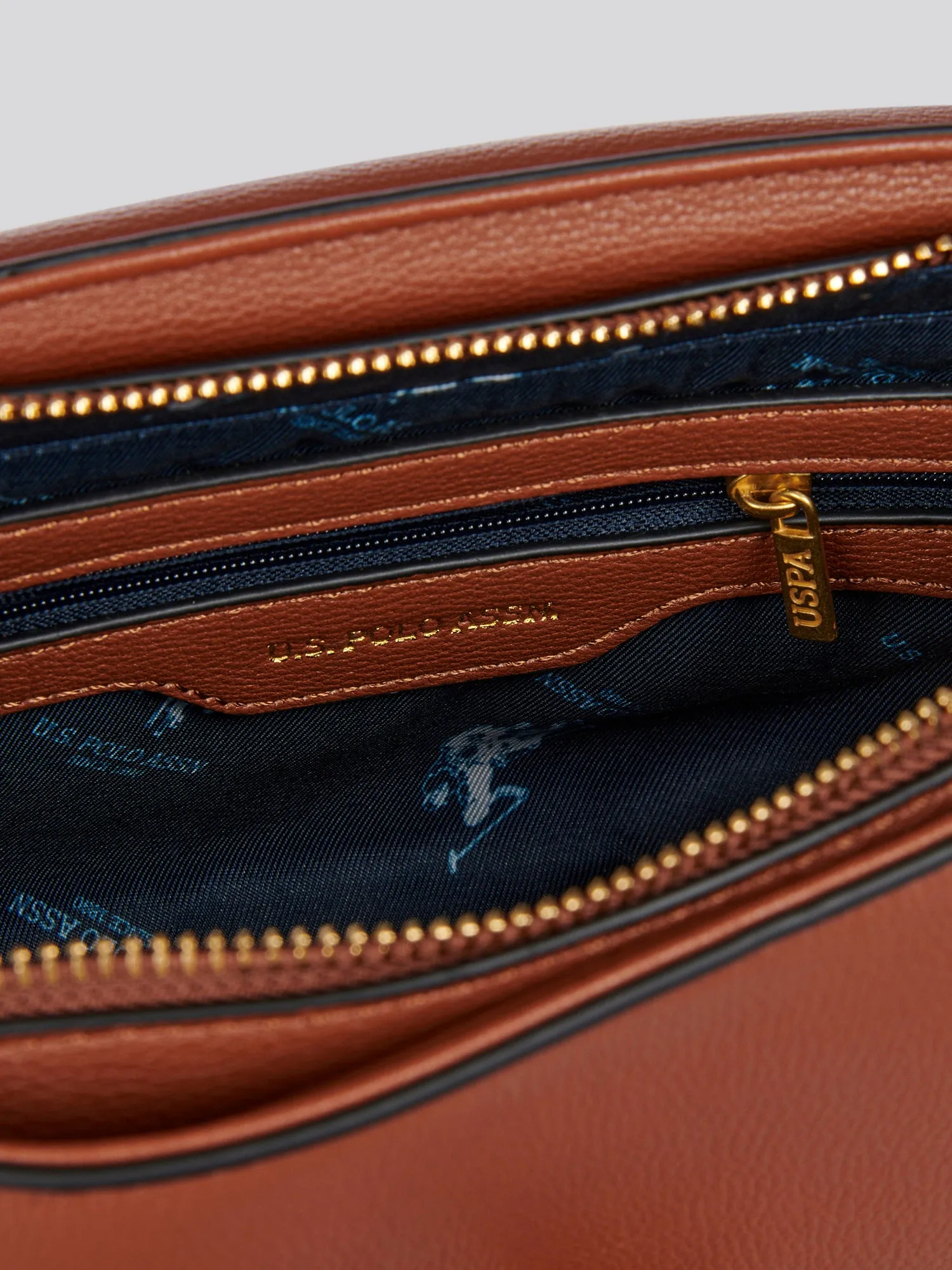 U.S. Polo Assn. Womens Earth Crossbody Bag in Tan