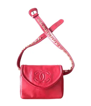 Vintage CHANEL red leather belt bag, fanny pack with detachable chain belt and CC stitch mark on flap.  Fits 29.5" through 32.8"