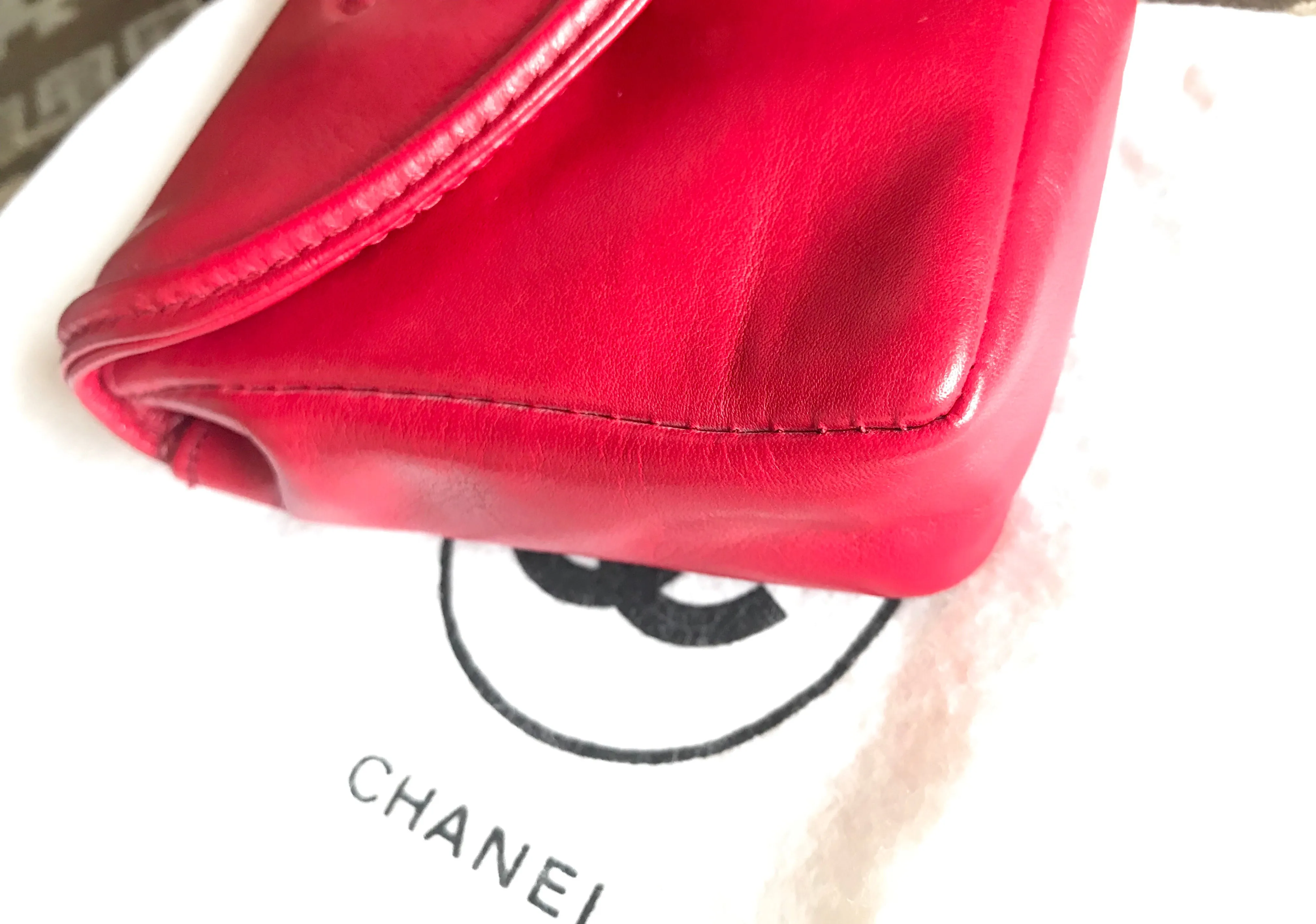 Vintage CHANEL red leather belt bag, fanny pack with detachable chain belt and CC stitch mark on flap.  Fits 29.5" through 32.8"