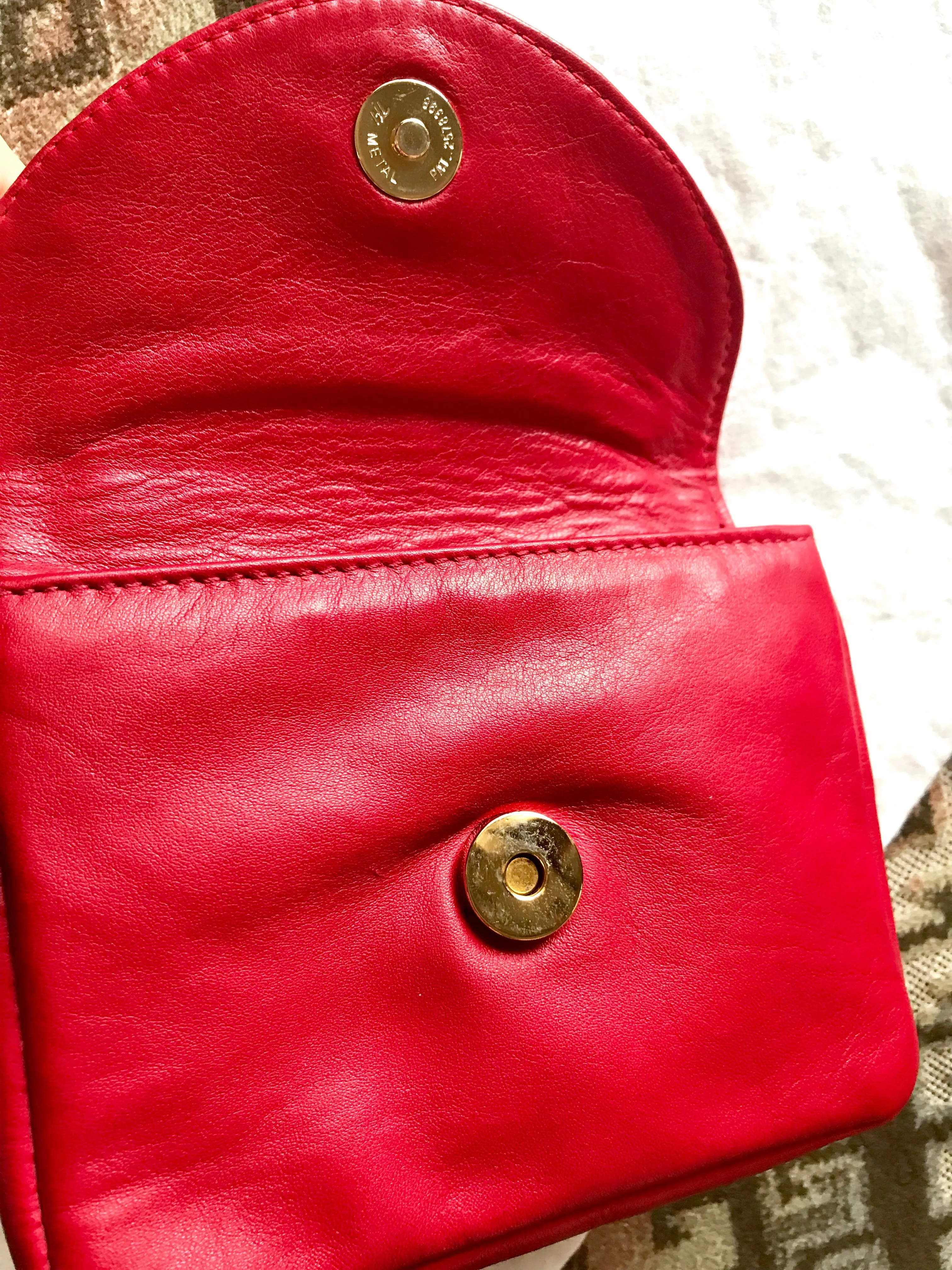 Vintage CHANEL red leather belt bag, fanny pack with detachable chain belt and CC stitch mark on flap.  Fits 29.5" through 32.8"