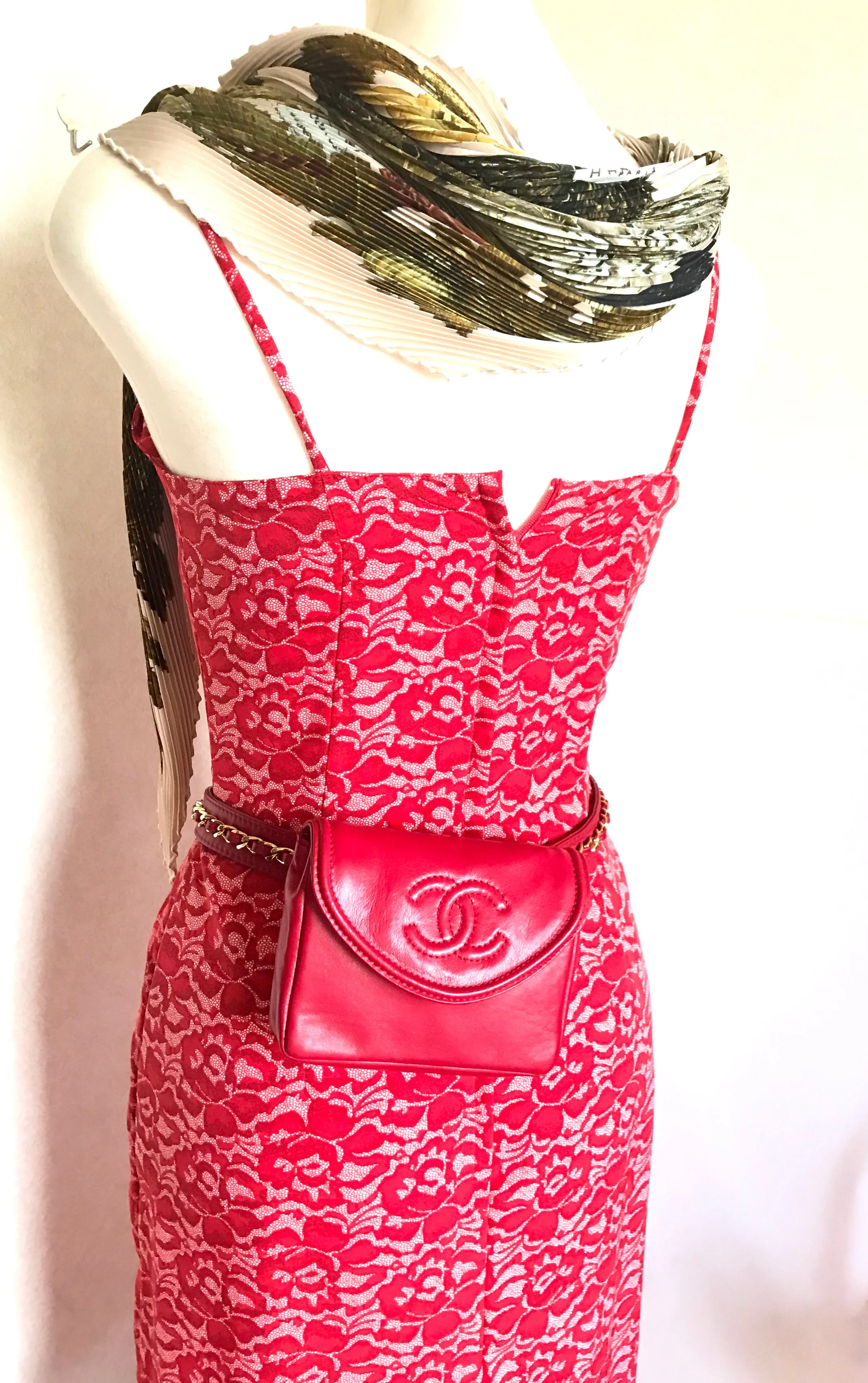 Vintage CHANEL red leather belt bag, fanny pack with detachable chain belt and CC stitch mark on flap.  Fits 29.5" through 32.8"