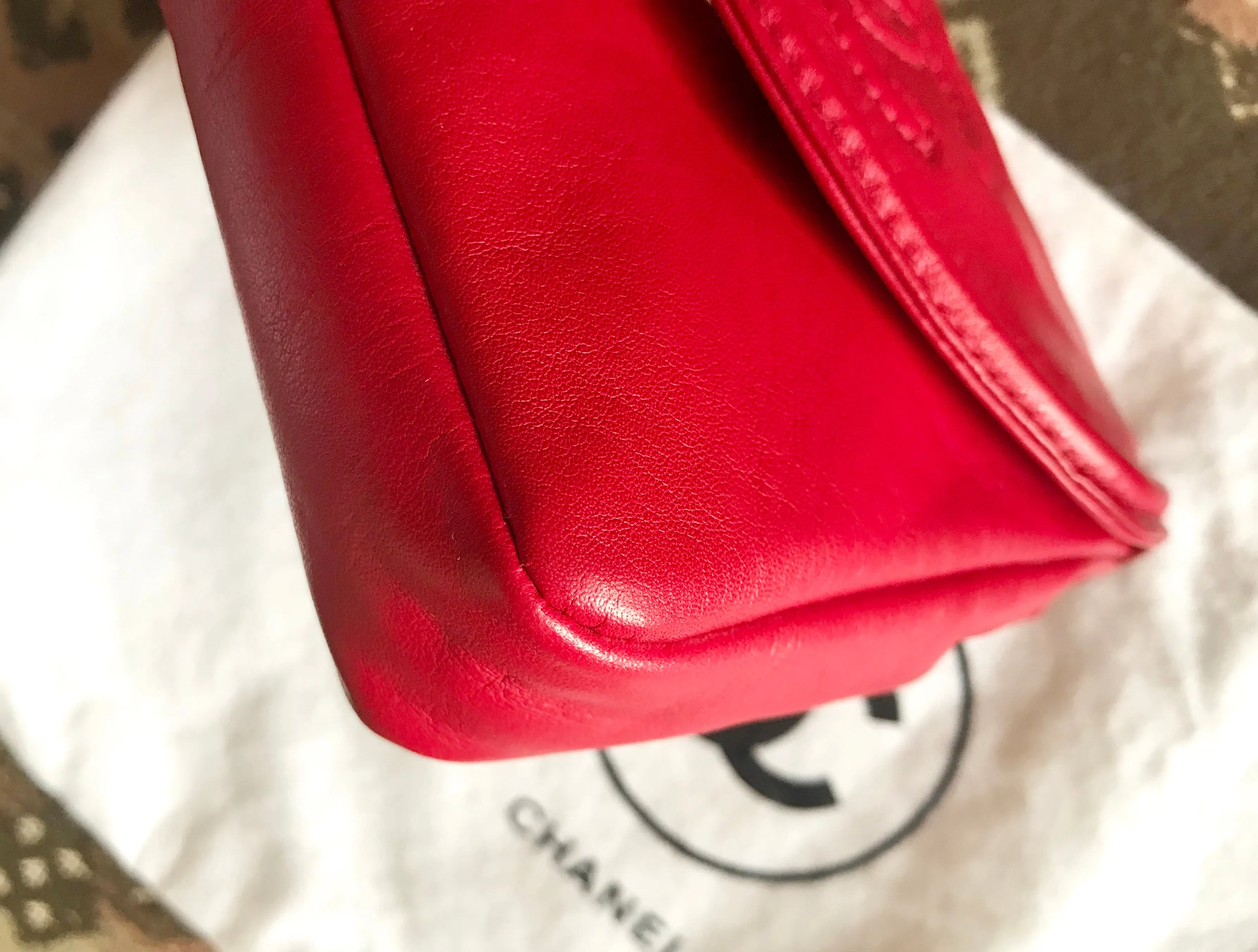 Vintage CHANEL red leather belt bag, fanny pack with detachable chain belt and CC stitch mark on flap.  Fits 29.5" through 32.8"